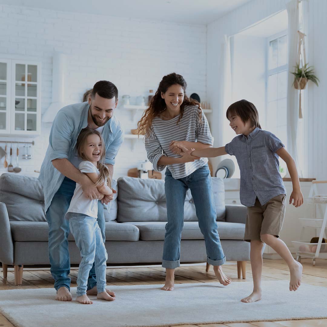 Family playing in living room